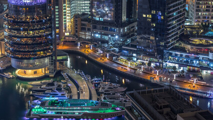 Night illumination of Dubai Marina aerial timelapse, UAE.