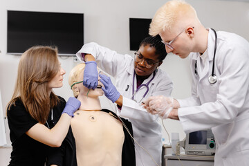 Medical Students Practicing Endotracheal Intubation on a Medical Mannequin