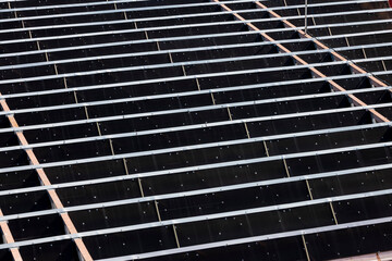 Aerial view of solar panels on building roof, Panama - stock photo