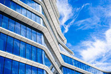 Modern office building with sleek horizontal lines and minimalist design, corporate office building...