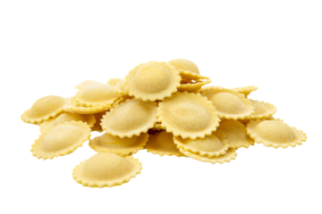a pile of pasta shells on a white surface