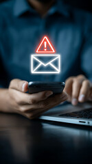 Glowing Envelope Alert Symbol Over Hand Holding Smartphone warning notification
