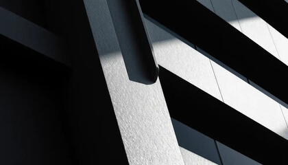 Abstract architectural lines and shadows create a dramatic contrast of light and dark on a textured...