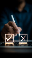 Hand holding stylus selecting checkmark and cross icons on digital interface image