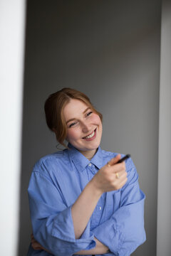 young woman watching tv