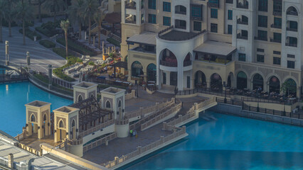 Dubai downtown during sunrise timelapse. Top view from above