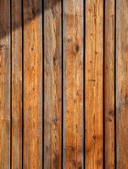 Rustic wooden planks arranged in a vertical pattern