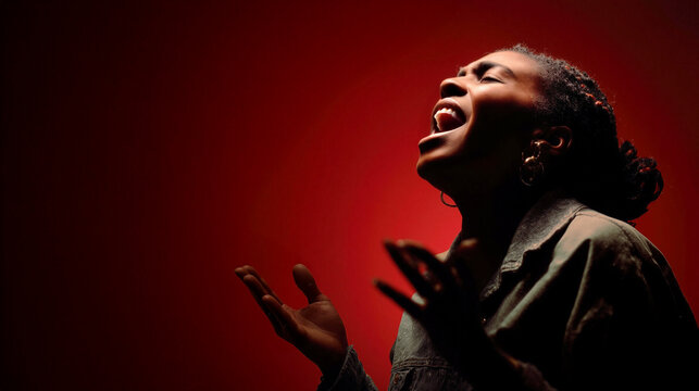 Expressive Spoken Word Poet Performing Against Dramatic Red Background