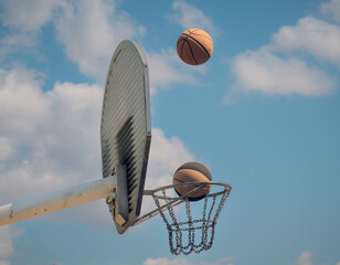Two basketballs scoring © Kinga