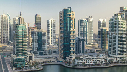 Fototapeta premium Amazing colorful dubai marina skyline during sunset timelapse