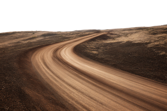 a dirt road winding through a barren landscape