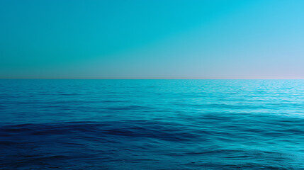 Obraz premium Serene ocean view with captivating blue gradient and gentle waves.