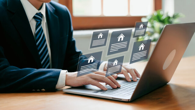 Professional analyzing property data on laptop, showcasing digital real estate listings and investment opportunities.