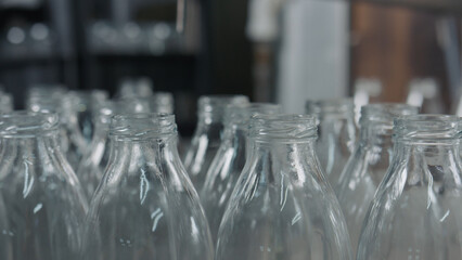 Empty glass bottles waiting for filling on
