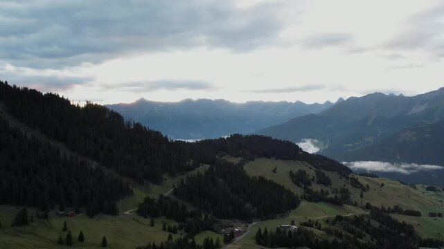 Peaceful Morning Fog Above Alpine Peaks &ndash; Serfaus Drone Shot