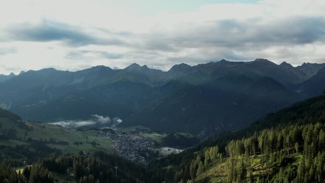 Sweeping Aerials of Serfaus Mountain Ranges in Soft Fog