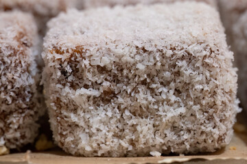 Closeup of coconut-covered lamington cake
