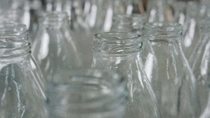 Empty glass bottles waiting for filling during