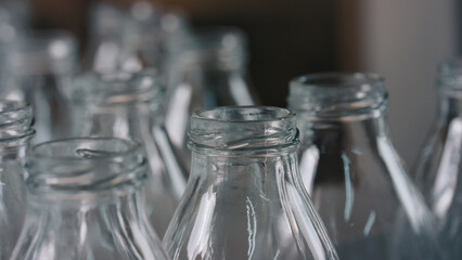 Empty glass bottles waiting for filling on