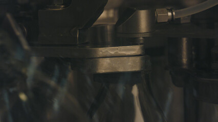 Industrial cheesemaking machine processing cheese