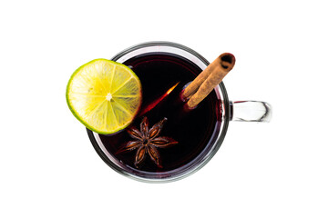 a glass of mulled with a lime slice and anise