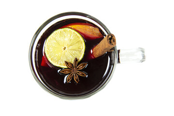a glass of mulled with a slice of lemon and anise