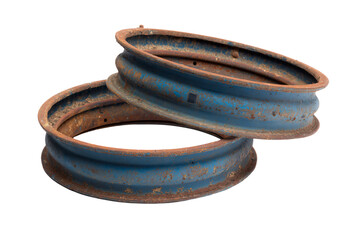 two rusty blue rims are stacked on top of each other