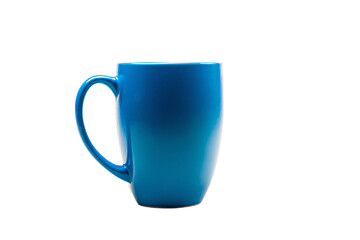 a blue coffee cup sitting on top of a white table