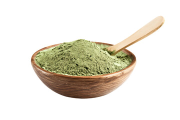 a wooden bowl filled with green powder and a wooden spoon