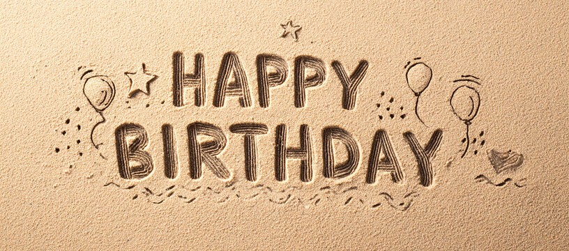 Playful Happy Birthday Sand Drawing Surrounded by Stars, Waves, and Balloon Shapes – Ideal for Festive Designs or Fun Web Banners