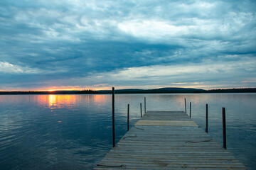 Fototapeta premium Sunset from the dock on Granite Hill Lake Ontario Canada