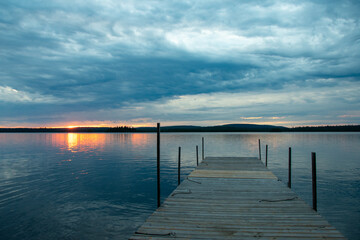 Fototapeta premium Sunset from the dock on Granite Hill Lake Ontario Canada