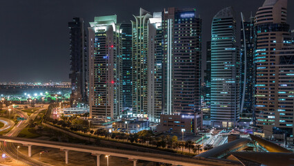 Obraz premium Aerial top view to Sheikh Zayed road near Dubai Marina and JLT timelapse, Dubai.