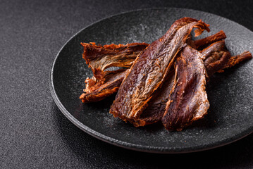 Dried salted fish as snacks or jerky, seafood as slices. Dried seafood snacks