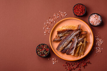 Dried salted fish as snacks or jerky, seafood as slices. Dried seafood snacks