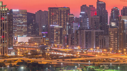 Dubai Marina skyscrapers and golf course day to night timelapse, Dubai, United Arab Emirates