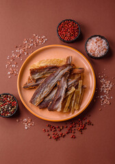 Dried salted fish as snacks or jerky, seafood as slices. Dried seafood snacks