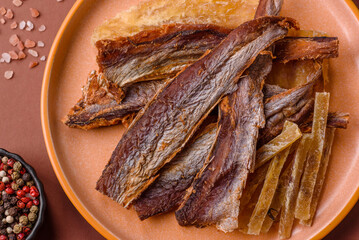 Dried salted fish as snacks or jerky, seafood as slices. Dried seafood snacks