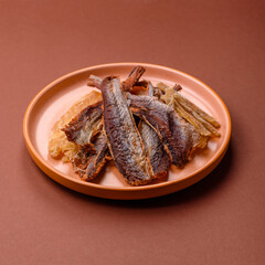 Dried salted fish as snacks or jerky, seafood as slices. Dried seafood snacks