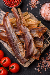 Dried salted fish as snacks or jerky, seafood as slices. Dried seafood snacks