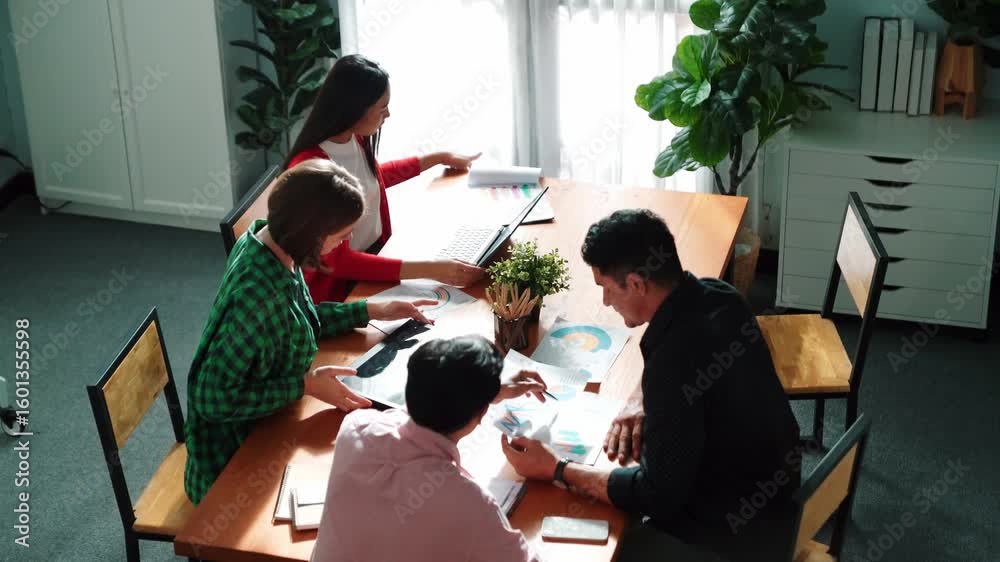 Canvas Prints top view of diverse business team explain marketing idea to investor while manager hold laptop and g