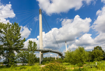 The Bob Kerrey Pedestrian Bridge crosses over the Missouri river, connecting Omaha, Nebraska with...