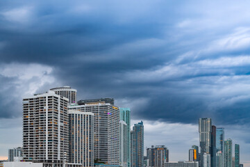 Downtown Miami's impressive residential real estate developments, showcasing a modern cityscape against a dramatic sky.
