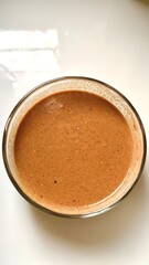 Close Up Still Life of Tahini Sauce in a Glass Bowl