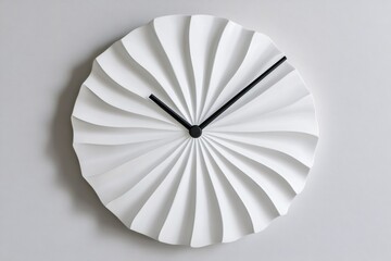 Obraz premium Minimalist white wall clock featuring sleek black hands, elegantly displaying time in a stylish modern interior setting
