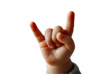 Adorable baby's hand displaying a rock and roll sign, epitomizing innocence and fun, isolated on transparent background