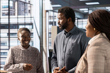 Team of black professionals collaborating on a new expansion project, focusing on company growth...