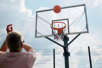 Sunny afternoon basketball practice at the local court