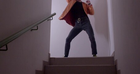 This video features two characters on a staircase a confident woman at the top and a man descending, symbolizing their journeys of progress and connection