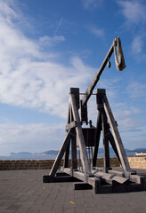Catapult in Alghero. Antique catapult by Alghero promenade, Sardinia 